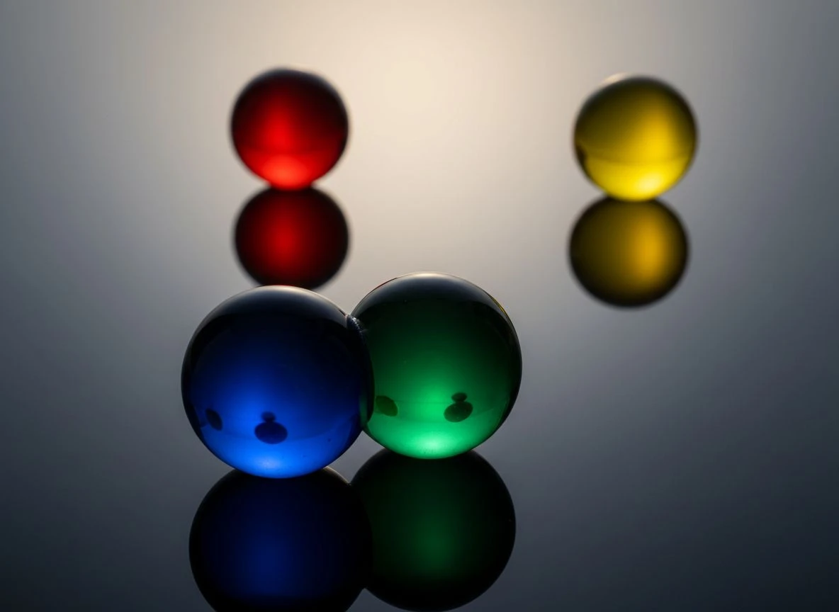 Two pairs of overlapping and separated glass spheres representing cross-category spillover.